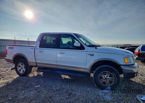 2002 Ford F150 Supercrew z USA, uszkodzony, nr VIN 1FTRW08L12KD07785